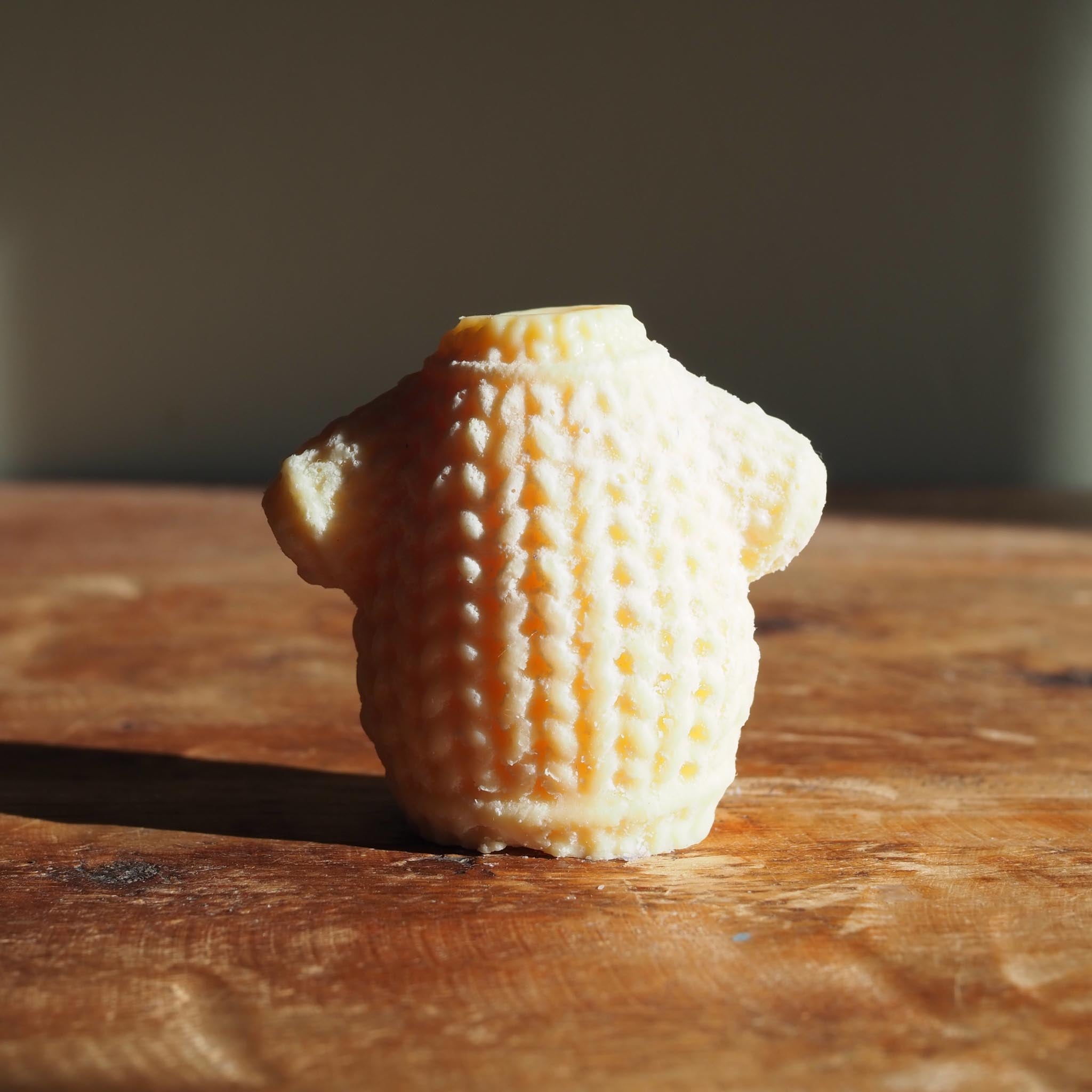 Eco-friendly soy wax melt evoking Irish gorse in full bloom, blending sweet coconut and wild floral fragrance from the Irish countryside.