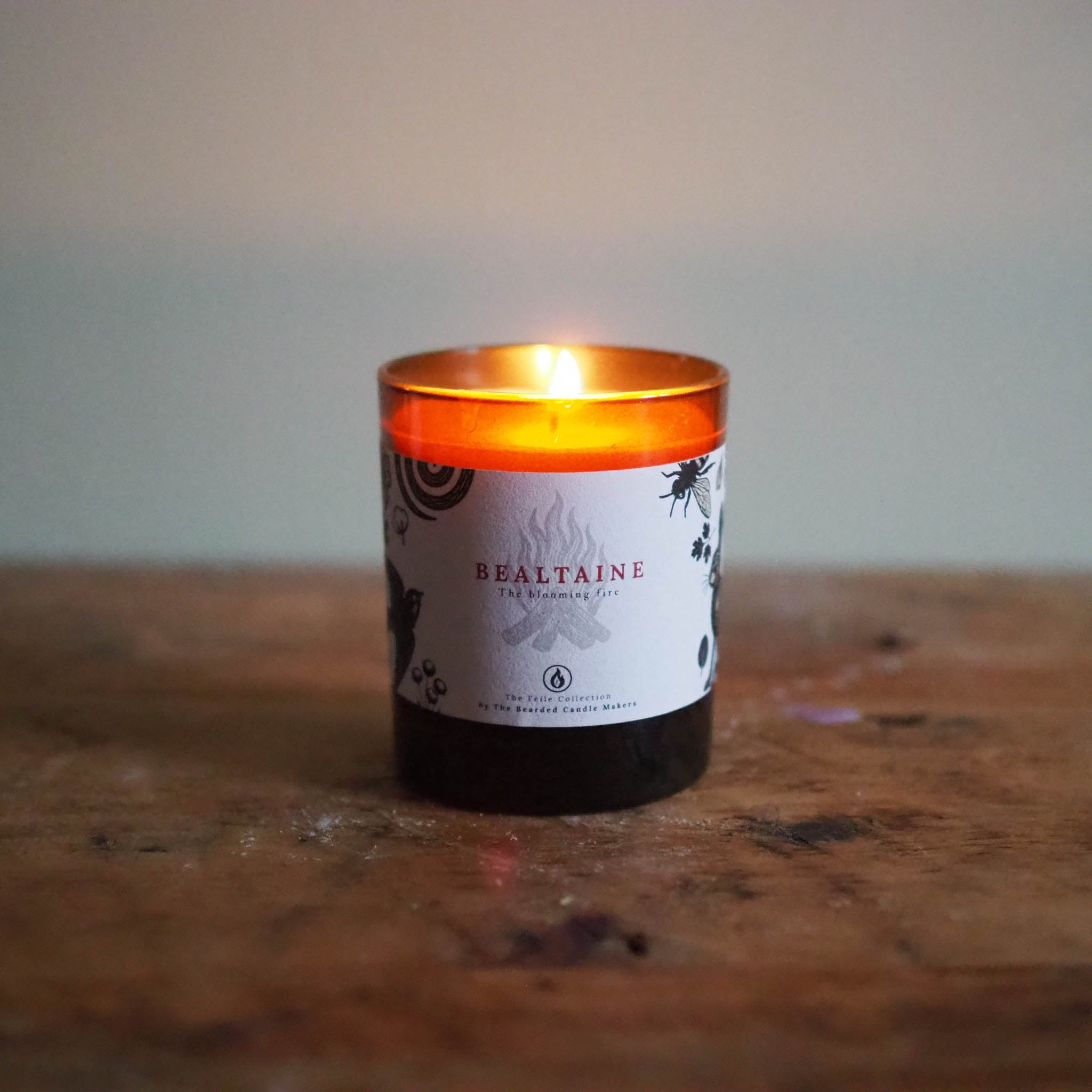 Hand-poured soy candle with citrus and wildflower notes celebrating the warmth of Irish summers.