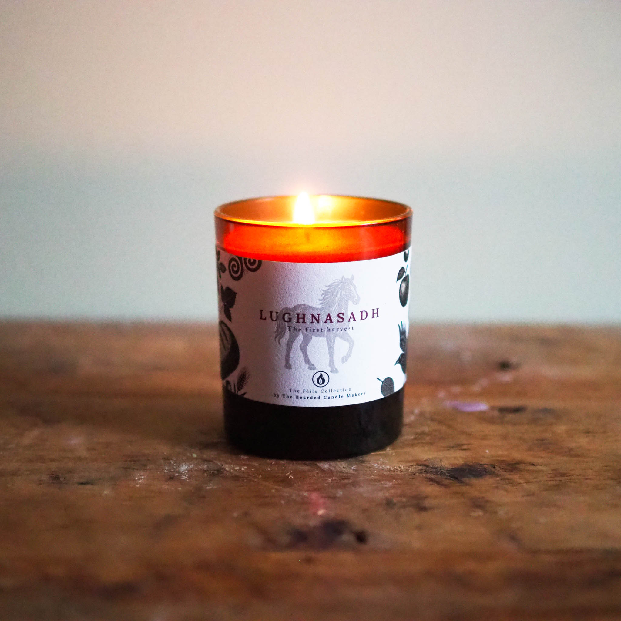 Warm golden candle evoking fields of grain, ripe fruit, and gratitude for the season’s abundance.