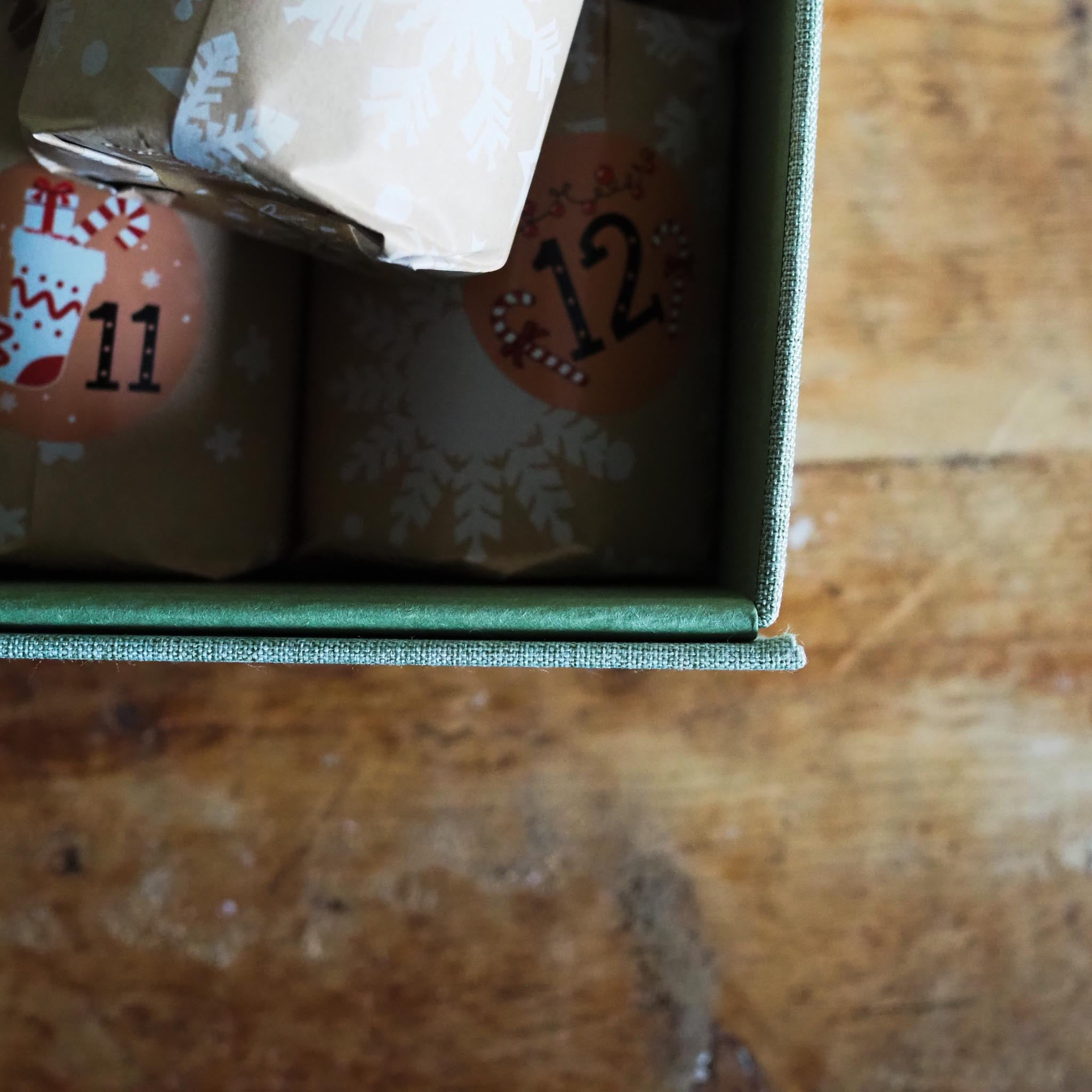 Candle advent set with postcards, story cards, and candle care guide from The Bearded Candlemakers