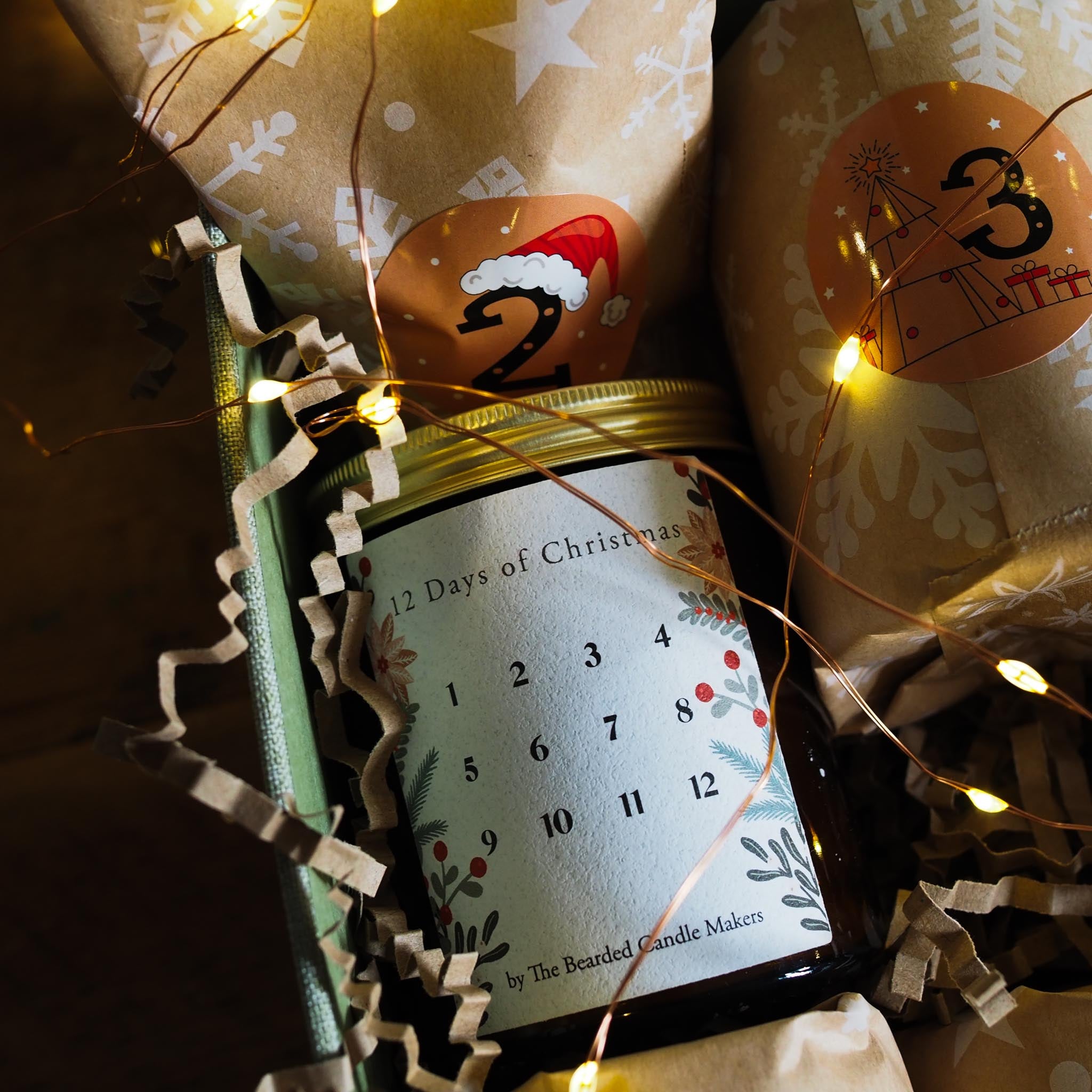 Calendar with '12 Days of Christmas' design, surrounded by festive decorations and string lights.